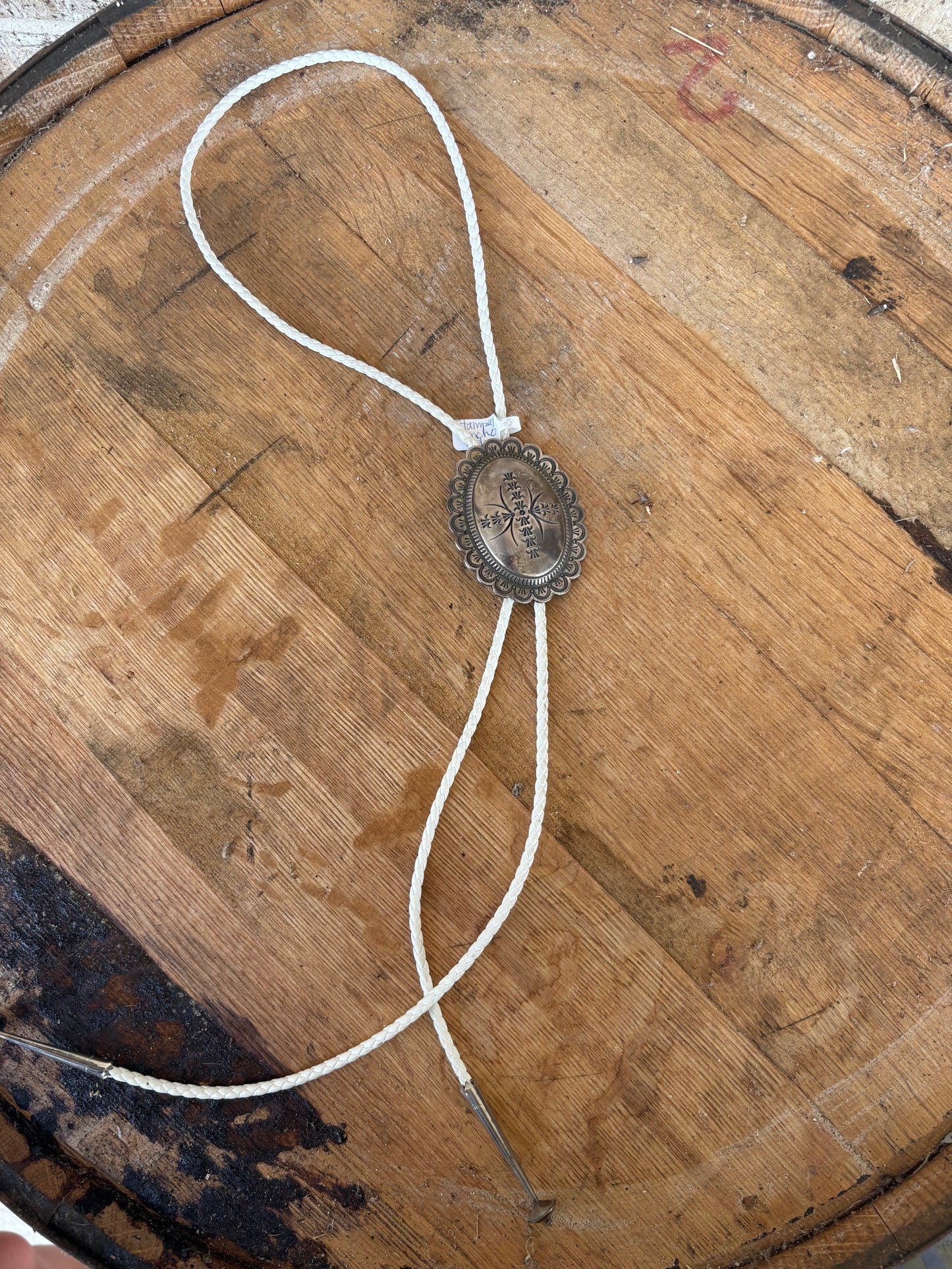STAMPED CONCHO LEATHER BOLO